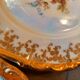 6 mismatched dessert plates decorated with roses