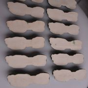 12 green earthenware knife rests