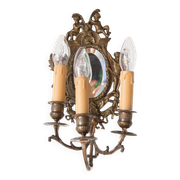 Pair of old French wall lights with beveled mirror and putti
