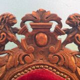Pair of Louis XIII style armchairs in carved wood