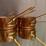 Suite of 12 tinned copper pans