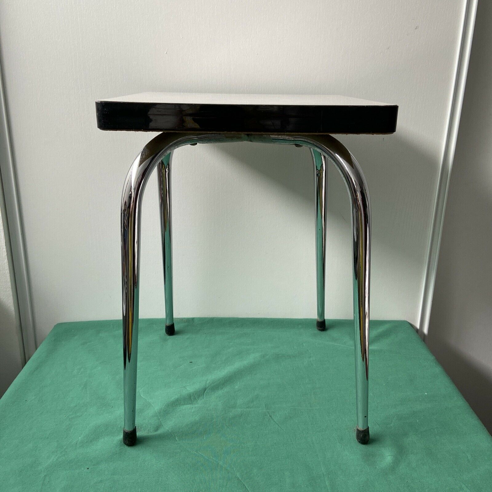 White stool in formica and metal