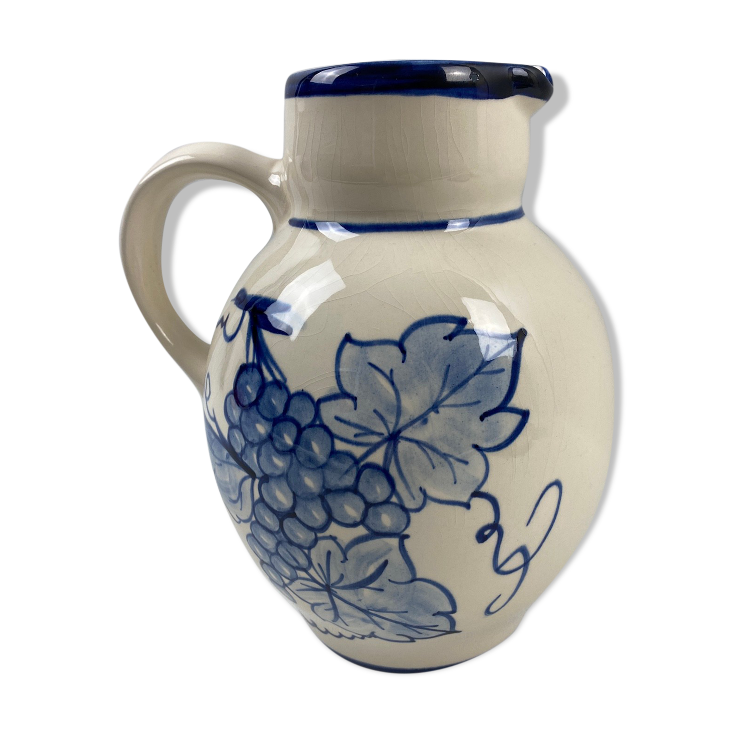 Ceramic pitcher decorated grapes