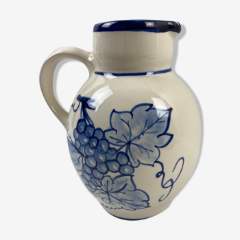 Ceramic pitcher decorated grapes