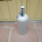 Ancienne bouteille en grès beige émaillé début 20e siècle