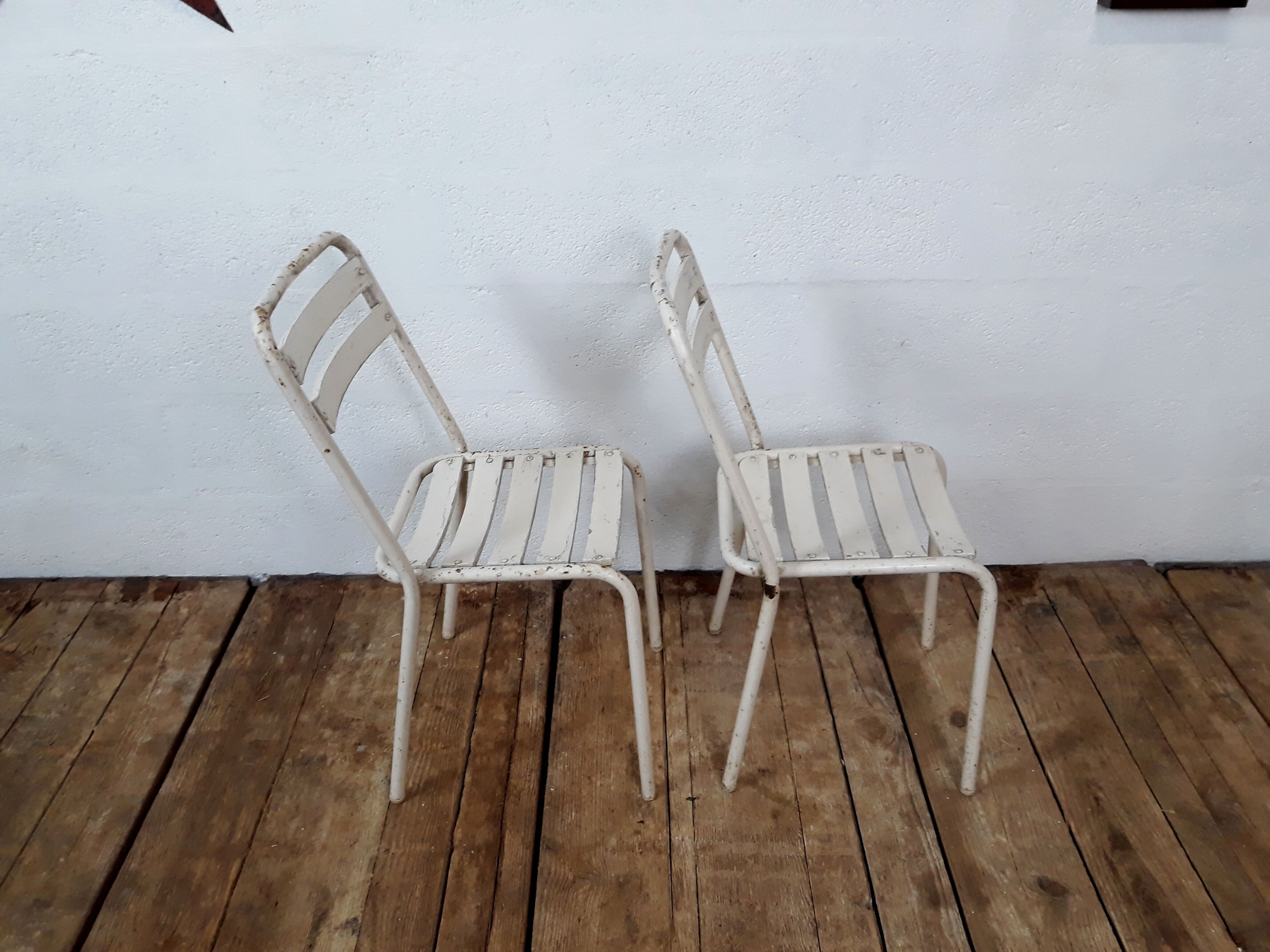 4 chairs and armchairs by Tolix