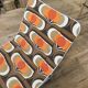 1970 orange pattern / chaise longue / vintage camp bed in metal and fabric