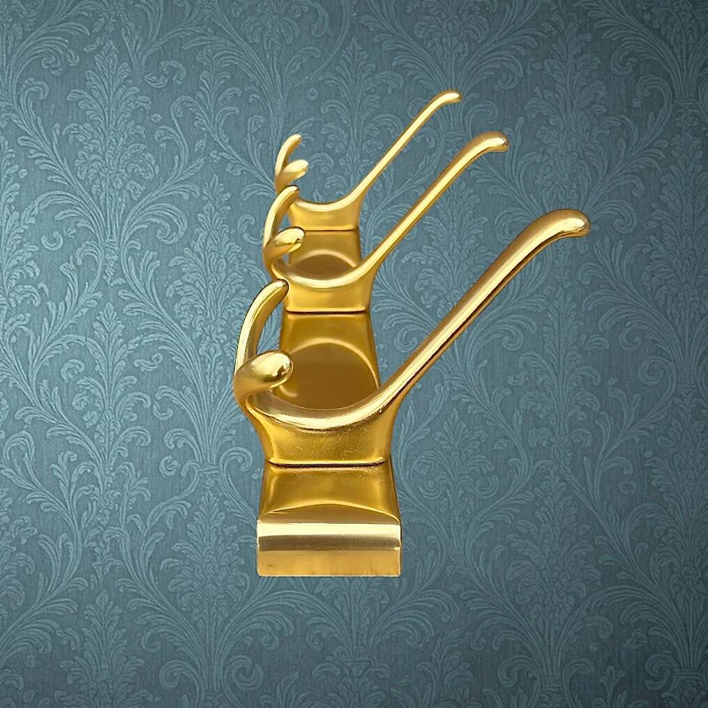 Vintage wall-mounted coat rack in anodised gold aluminium with 3 hooks from the 1970s.