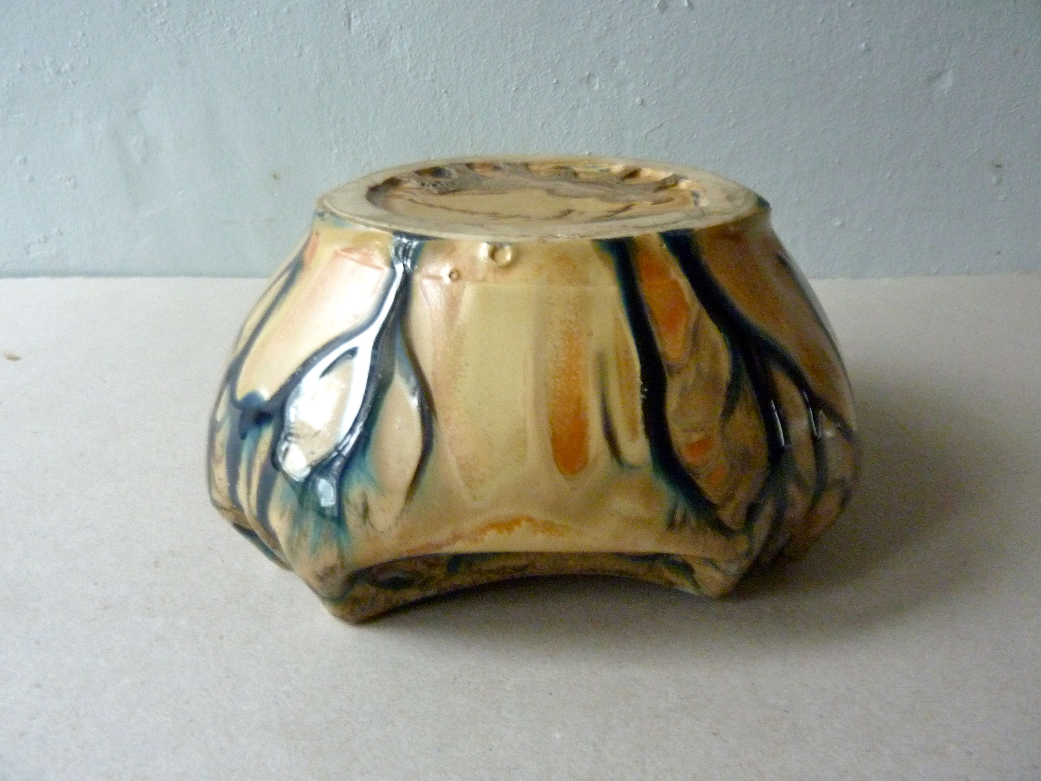 Void signed pocket méténier, enamelled stoneware, period art deco