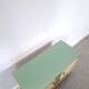 Vintage green DDR cabinet, model Libelle with glass top, slanted legs.