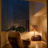 Marsala armchair and its light beige Ligne Roset footrest.