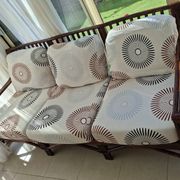 Vintage salon Maison Maugrion in rattan with leather and feather finishes.