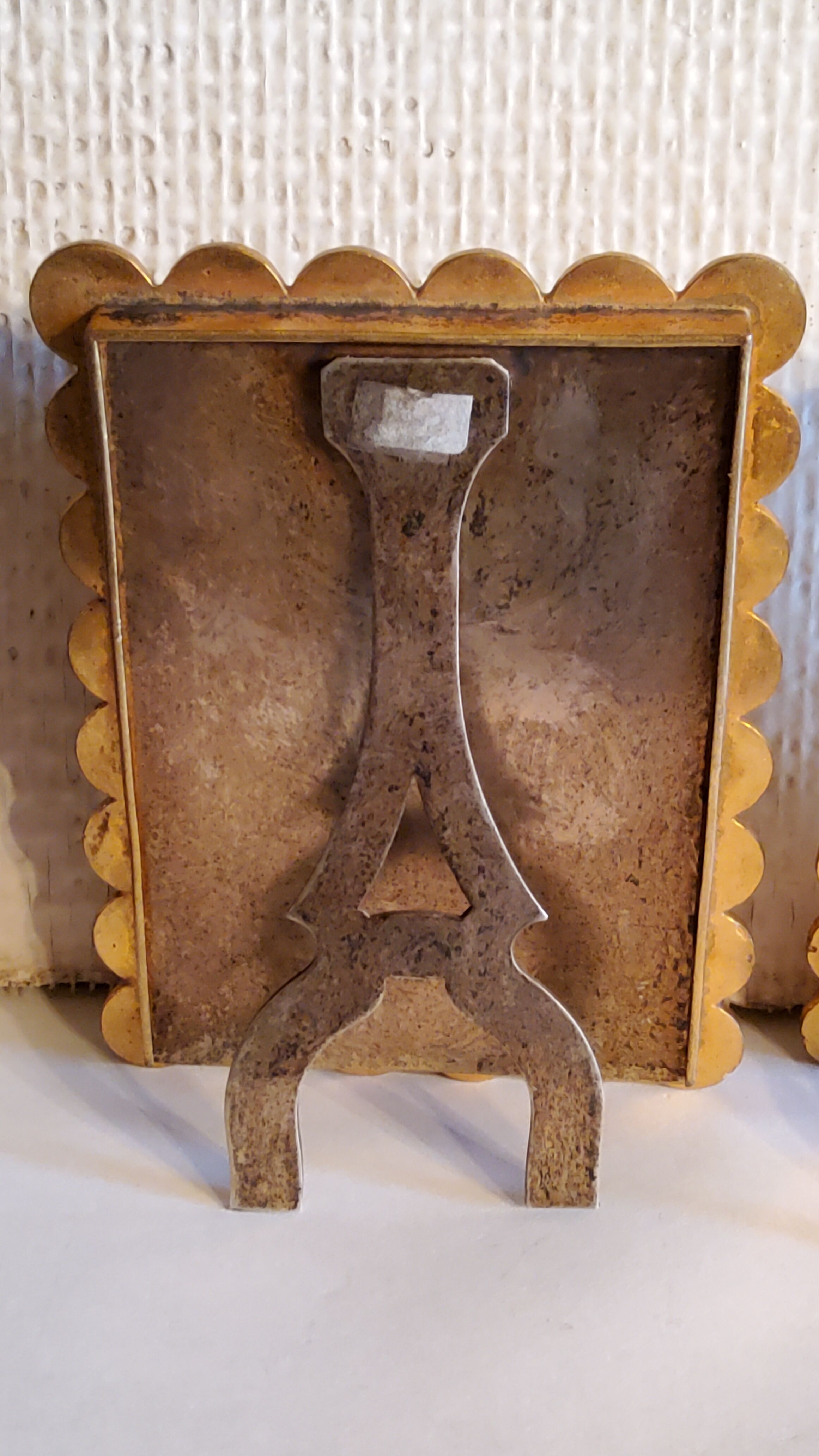 Pair of art deco photo frames in gilded bronze and gilded brass