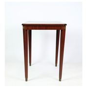 Side table decorated with bronze ornaments in light mahogany