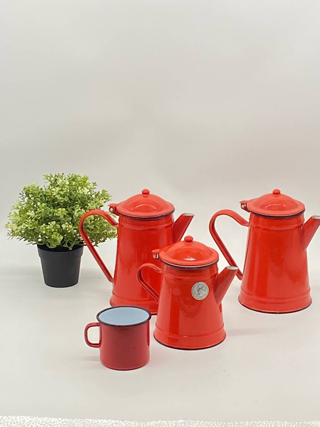 Set of red/white enameled metal coffee makers, vintage