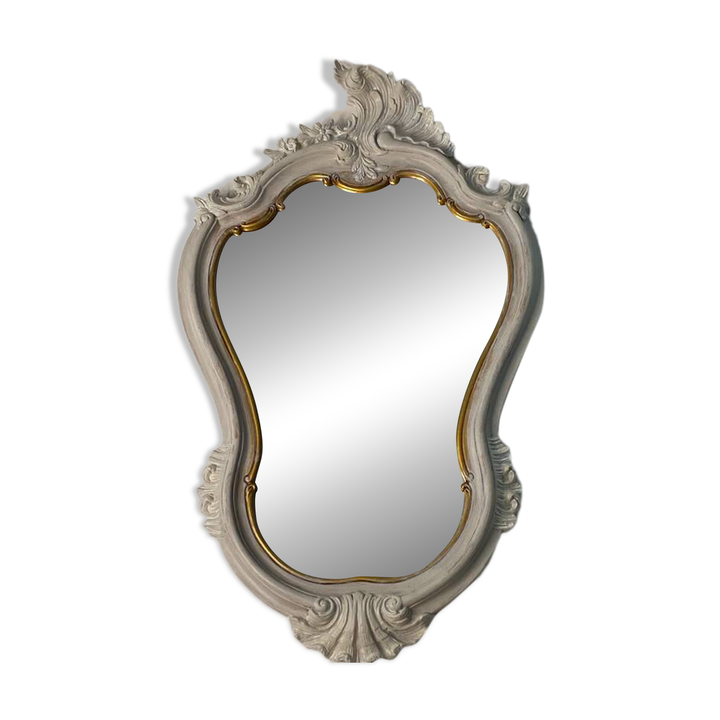 Magnificent patinated and gilded baroque style mirror