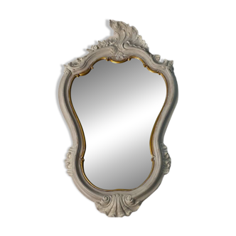 Magnificent patinated and gilded baroque style mirror