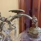 Bronze table lamp with dragon arm and cut glass shade, 1940s