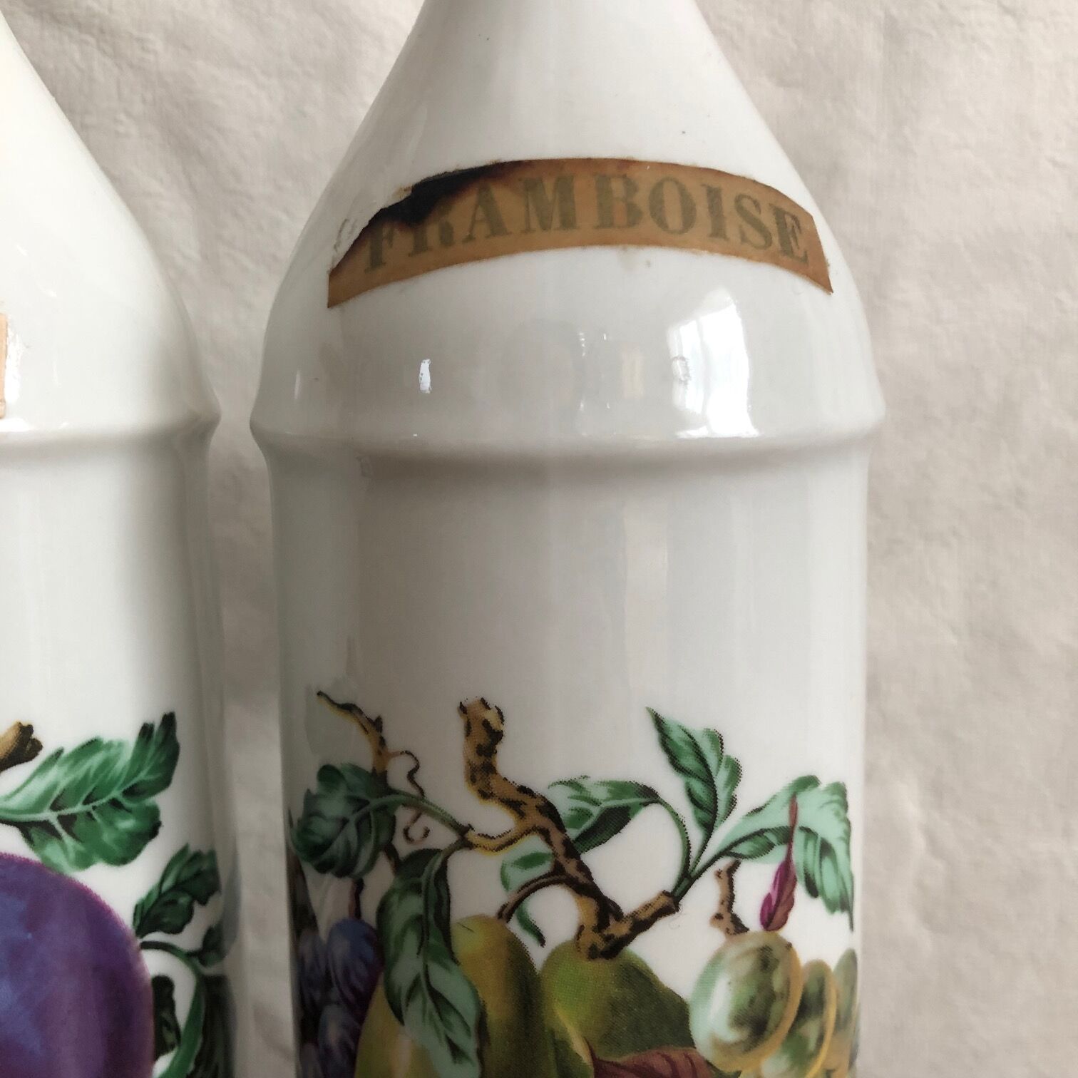Porcelain bottle duo for mirabelle and raspberry brandy