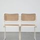Lot de 4 chaises de salle à manger blanches au design vintage dans le style de Marcel Breuer avec assise en osier