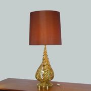 Lamp to lay on the foliage of golden ferns