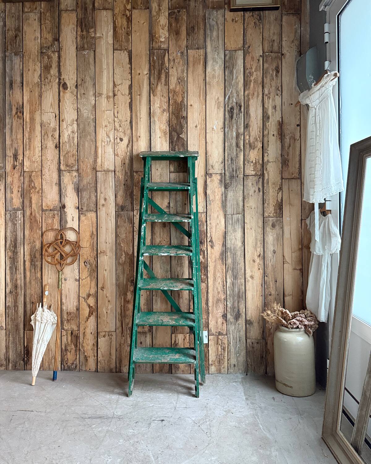 Vintage stepladder with green patina