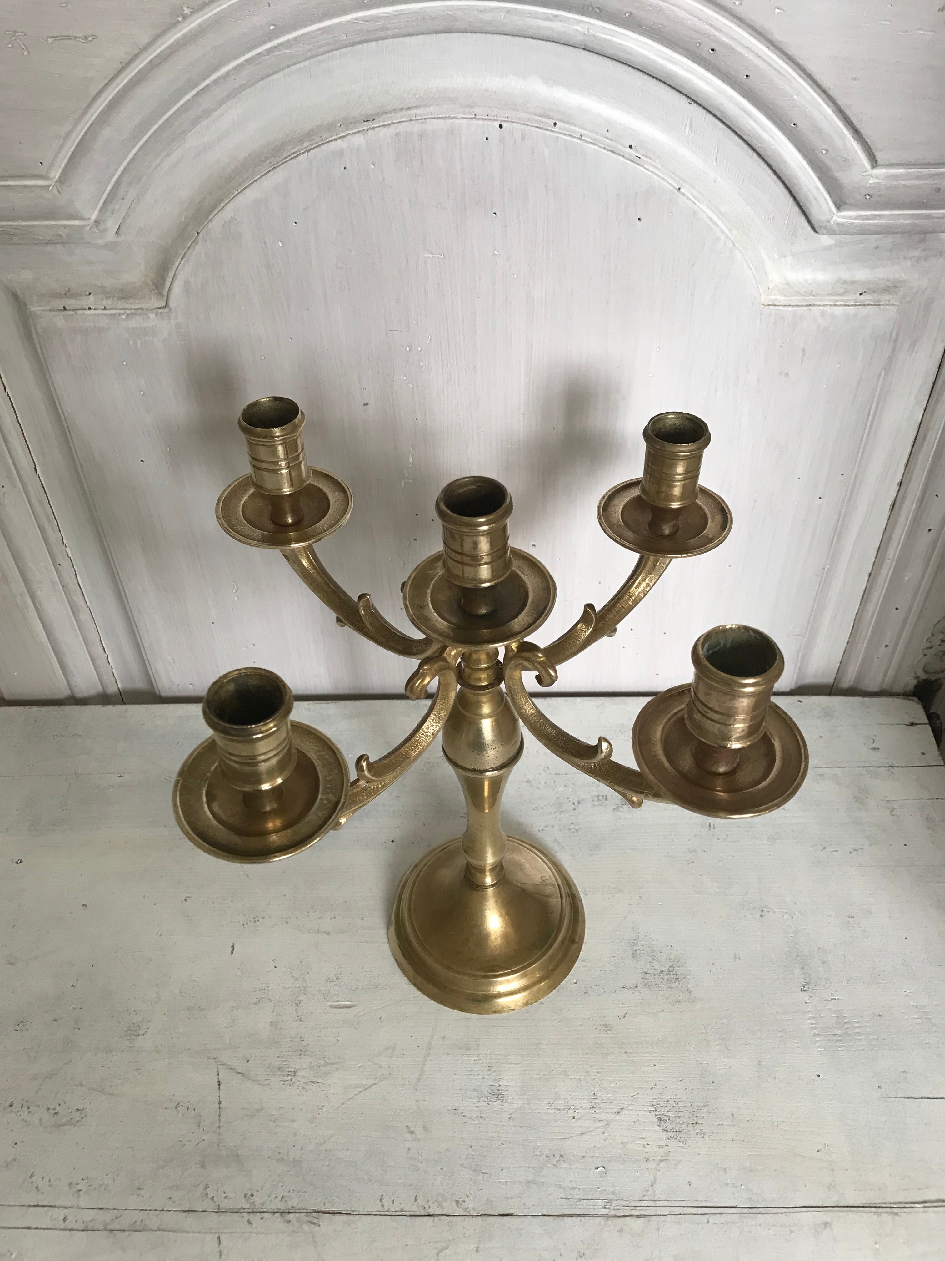 Ancient gilded bronze candlestick