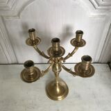 Ancient gilded bronze candlestick