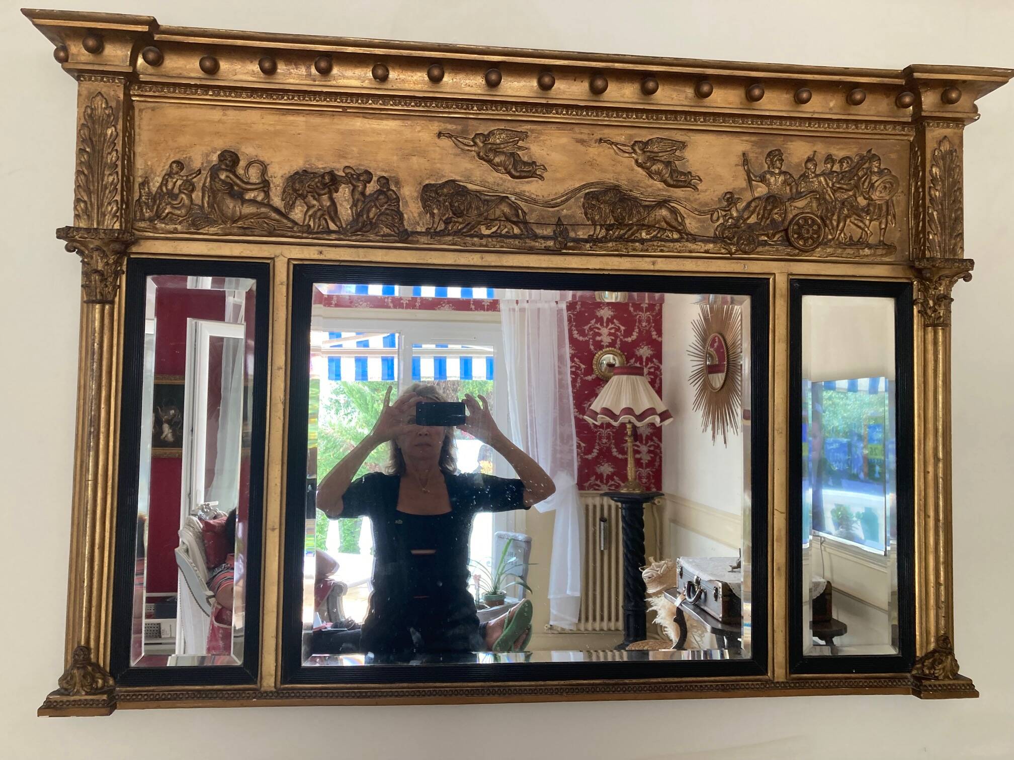 Empire style triptych mirror in gilded wood