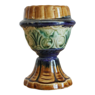 Late 19th century earthenware egg cup in slip