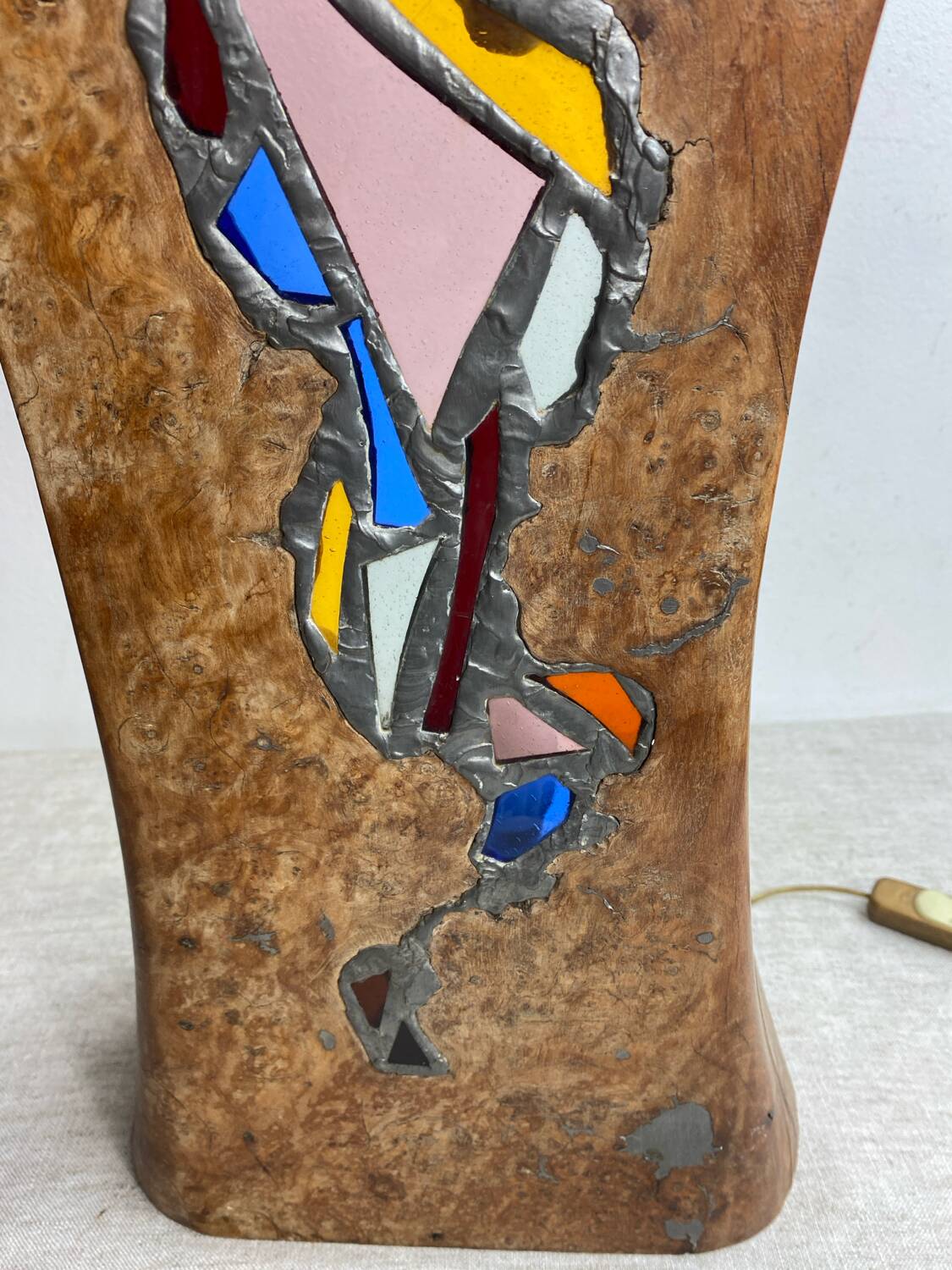 Carved wooden lamp and stained glass