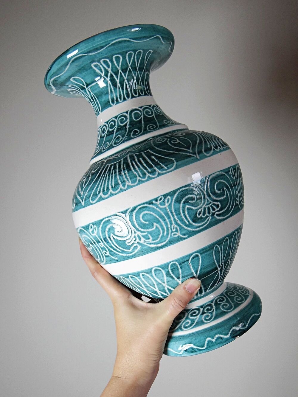 Vintage turquoise ceramic baluster vase with incised decoration.