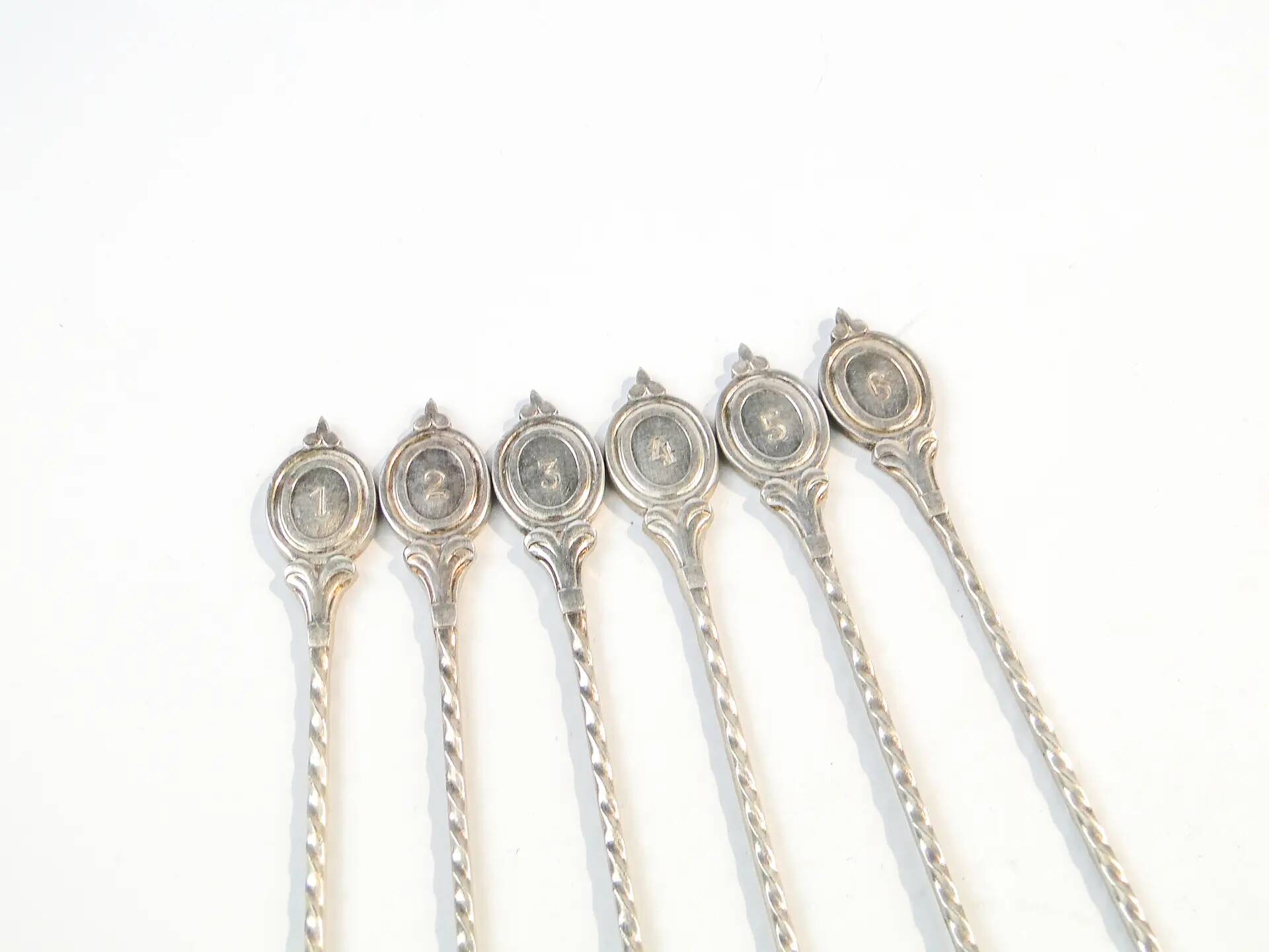 Set of neoclassical cocktail spoons, silver-plated brass, G.A.B., Sweden, 1930s