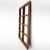 Vintage wooden window converted to a mirror