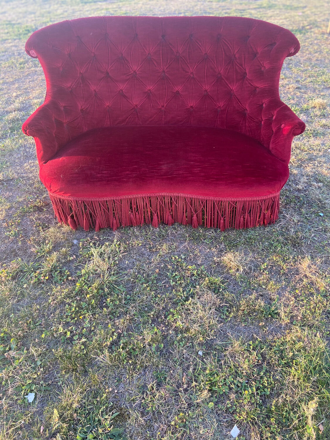 Small old Napoleon III toad sofa in red velvet