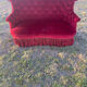Small old Napoleon III toad sofa in red velvet
