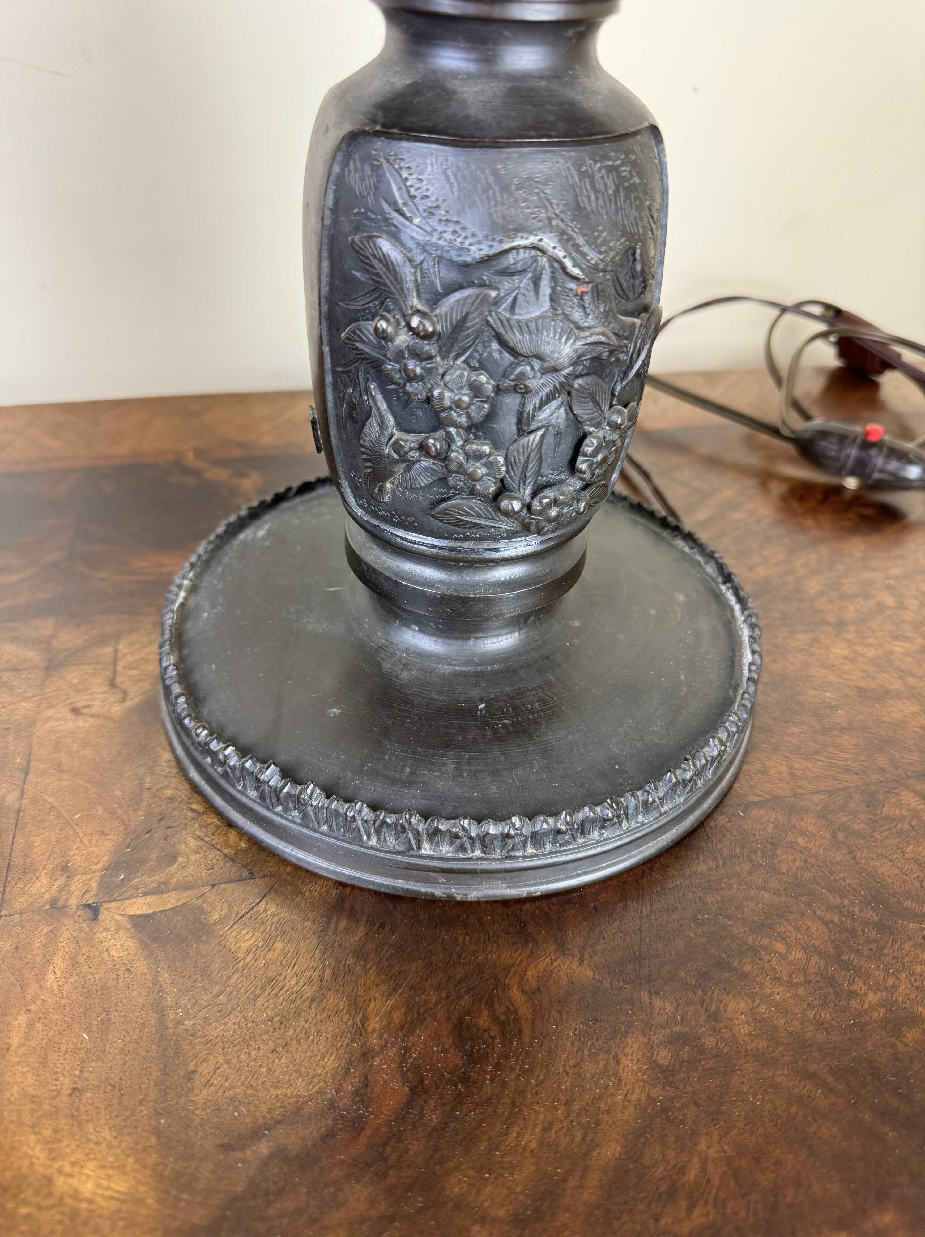 Japan Meiji period: Pair of patinated bronze candlesticks circa 1880