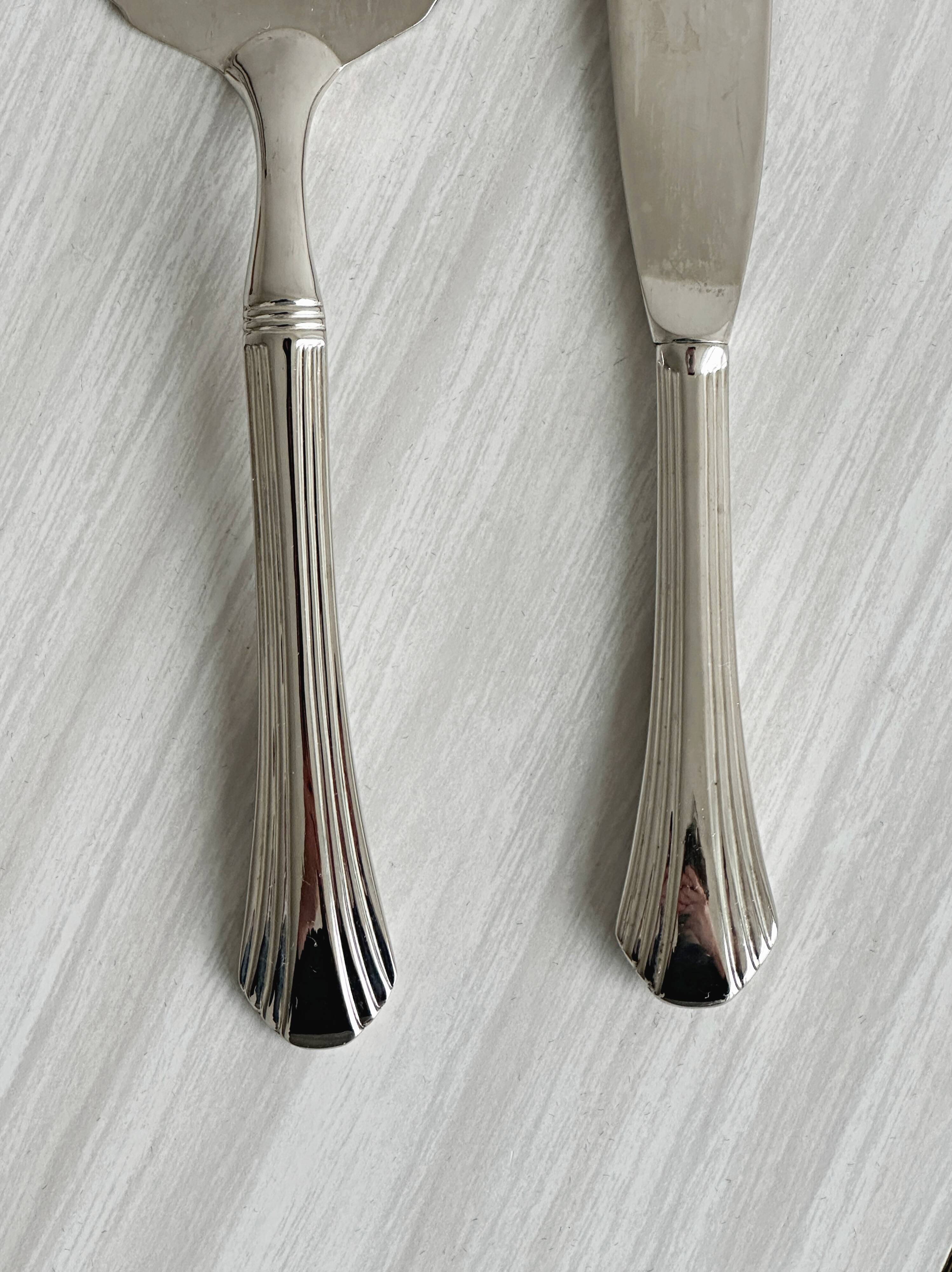 Antique patinated metal serving cutlery