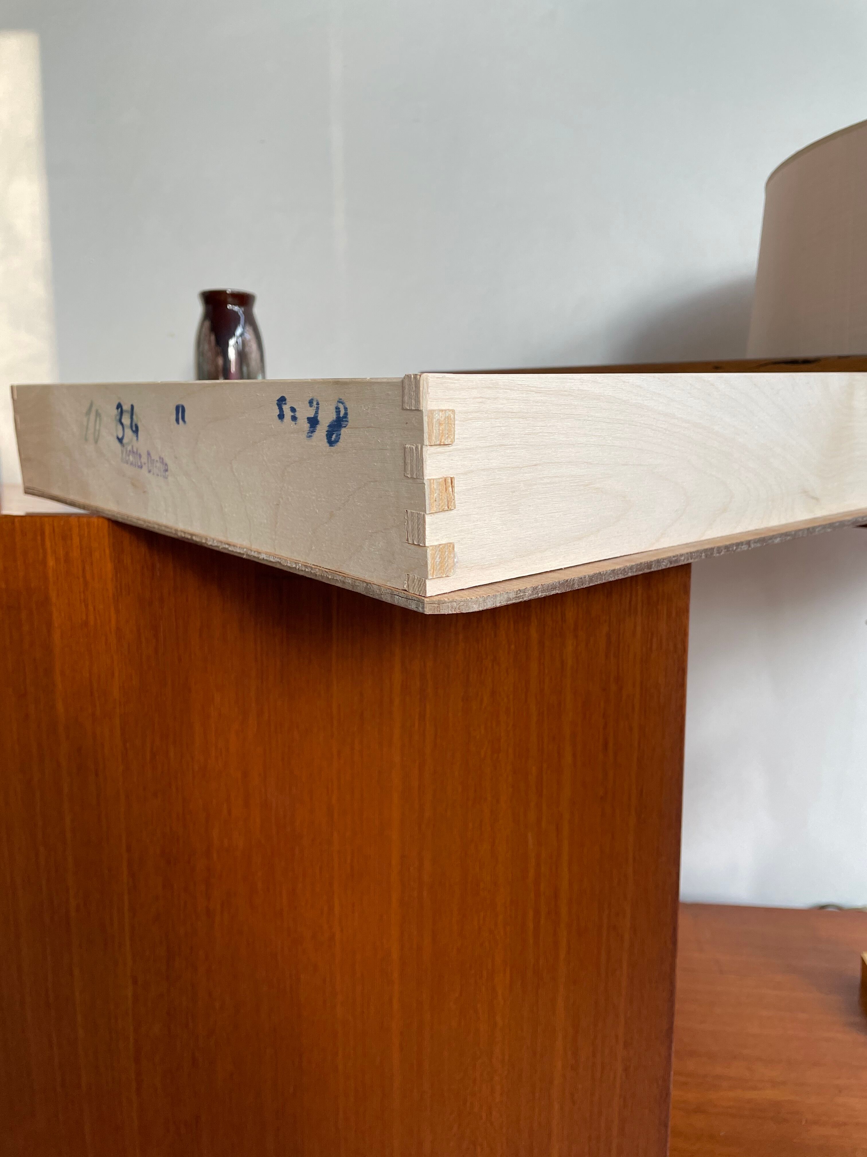 Asymmetrical vintage teak row