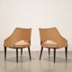 Pair of vintage armchairs from the 50s-60s in ebony wood, brass, with padded seats.
