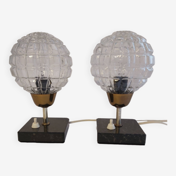 A pair of bedside lamps