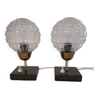 A pair of bedside lamps