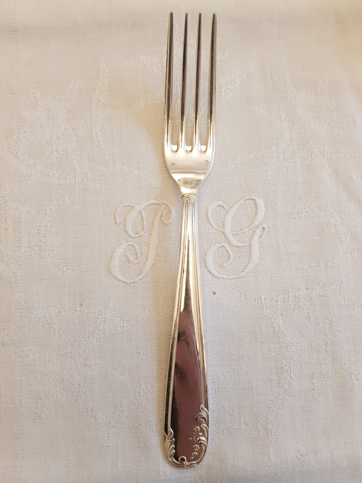 Silver cutlery set with 36 place settings and ladle