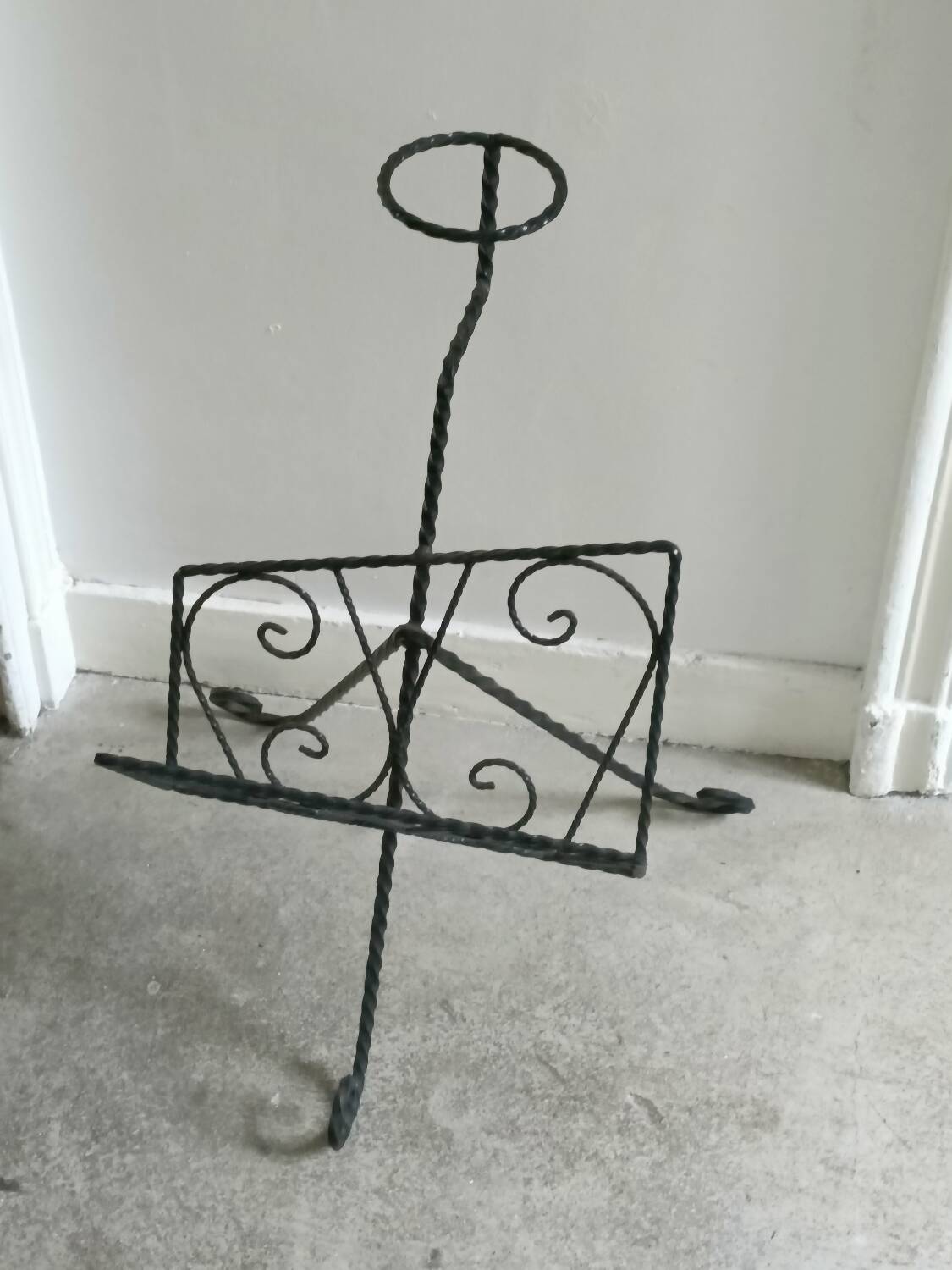 Vintage wrought iron magazine rack
