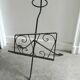 Vintage wrought iron magazine rack