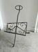 Vintage wrought iron magazine rack