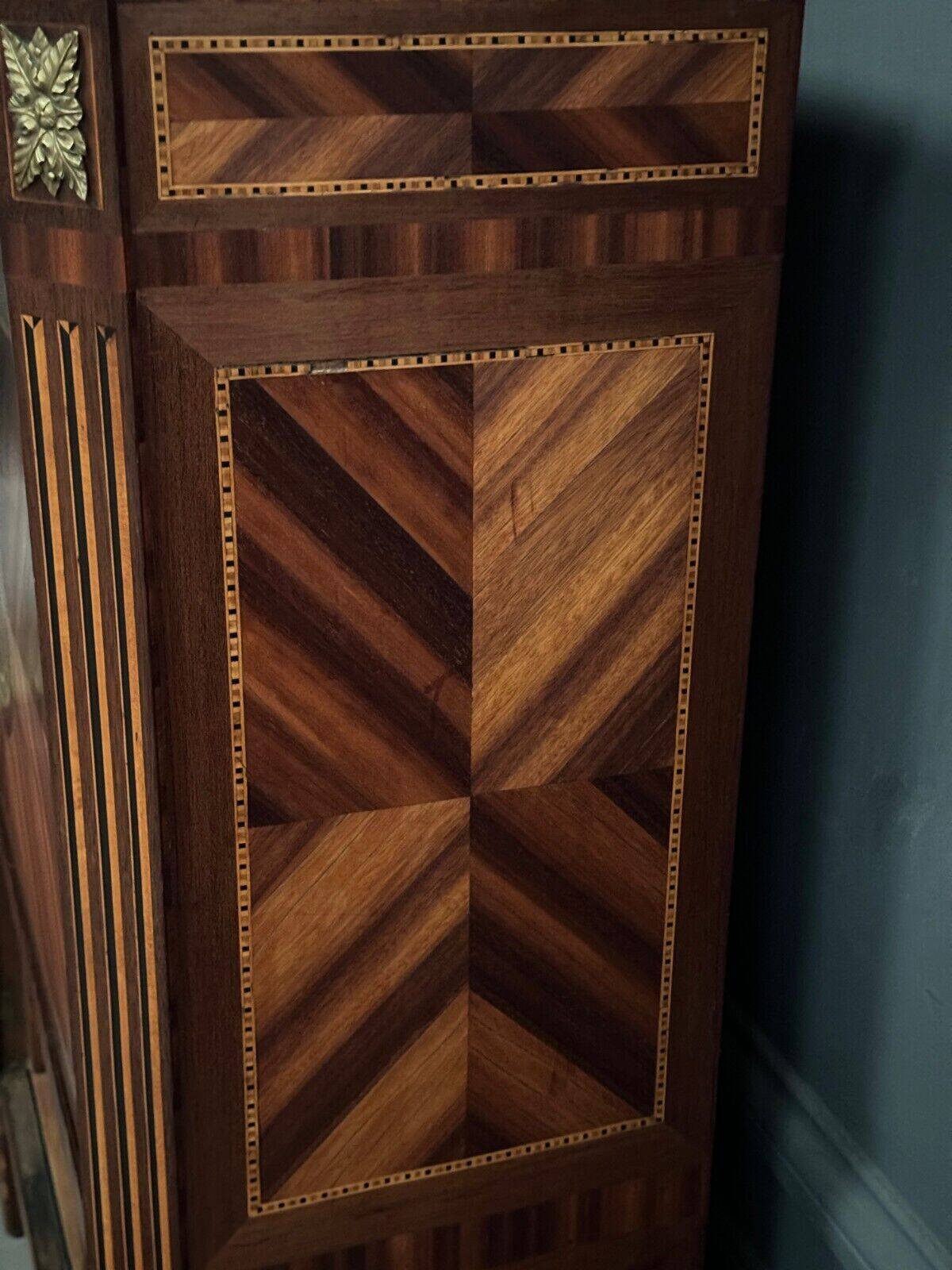Louis XVI period secretary in monogram marquetry and white marble