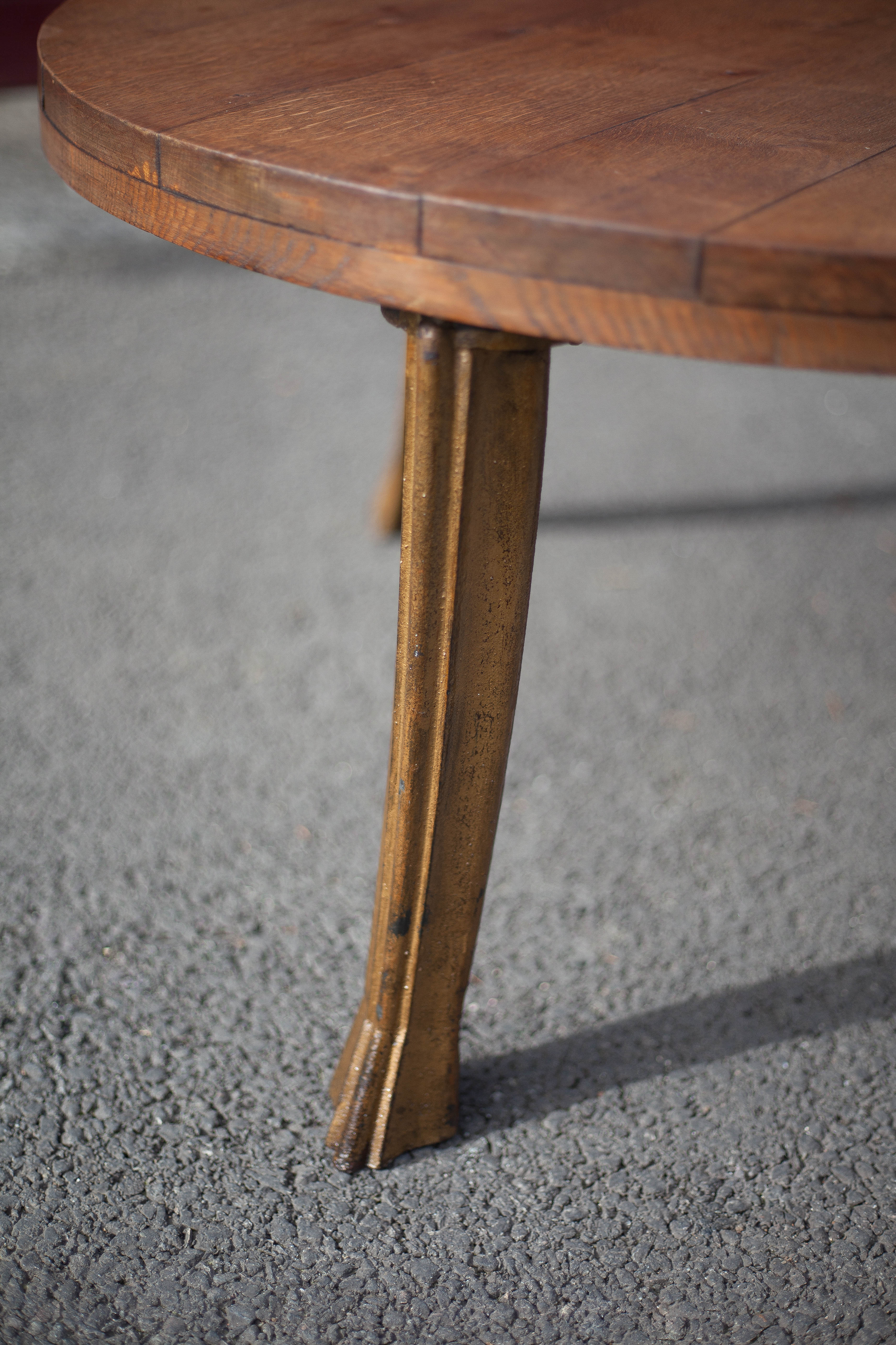 Wooden coffee table with cast iron legs