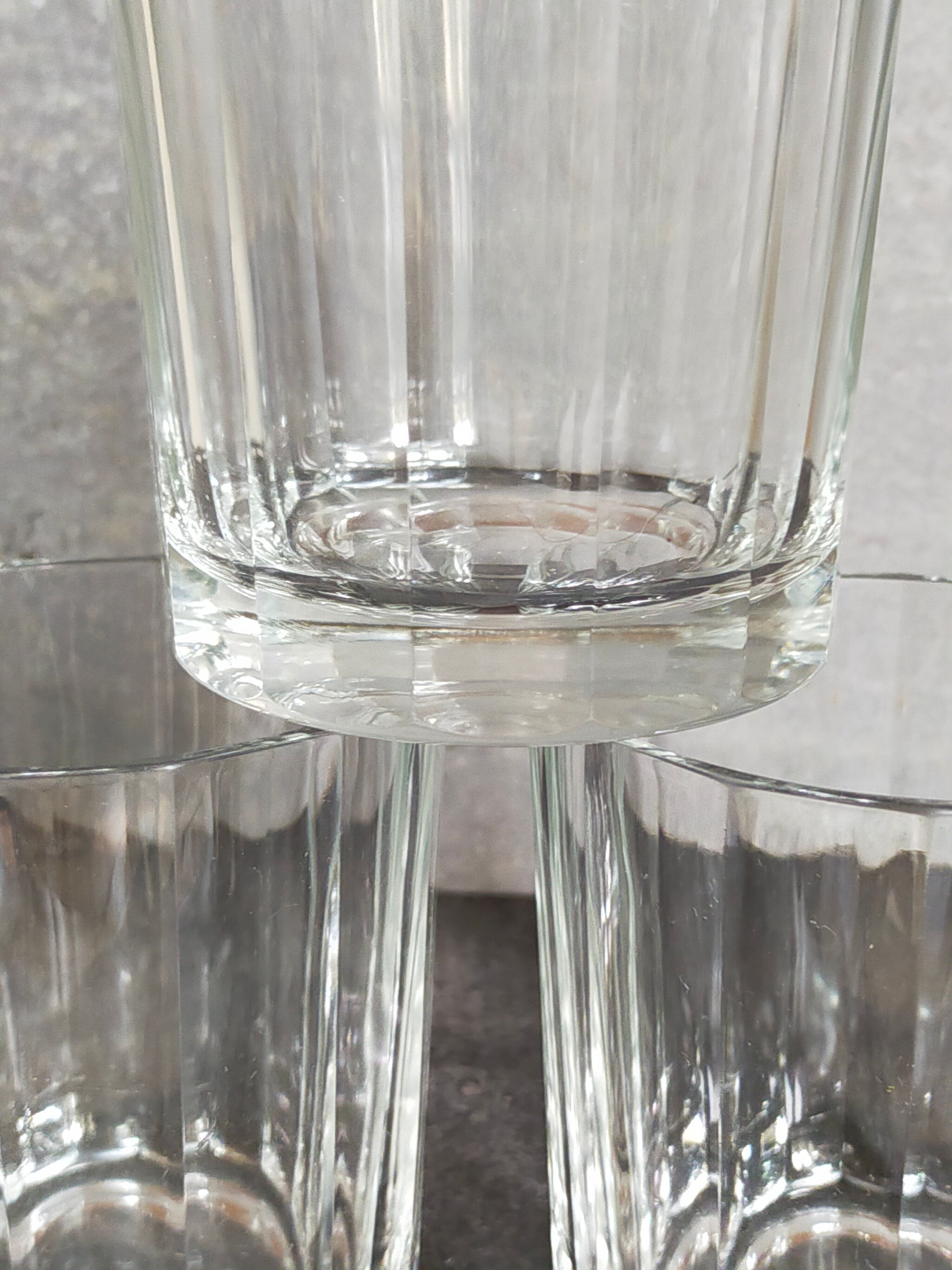 Three Art-Deco crystal whiskey glasses with cut sides