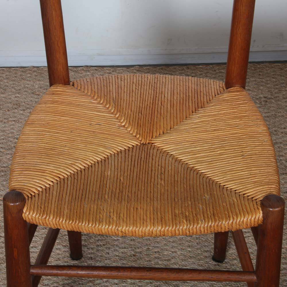Set of 4 wooden chairs with rush seats, French work, 1950.